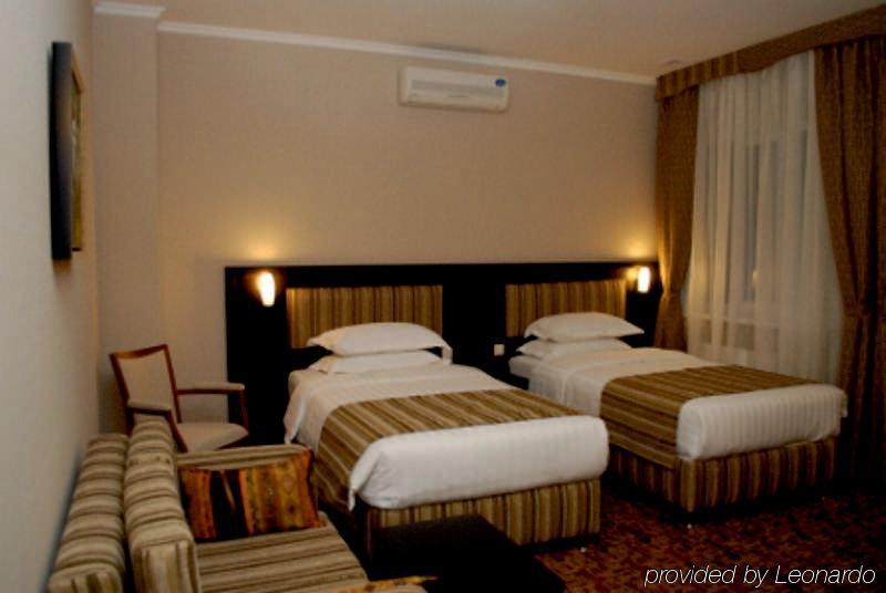 Inn Ozz Astana Habitación foto